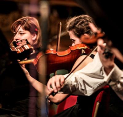 women with violins