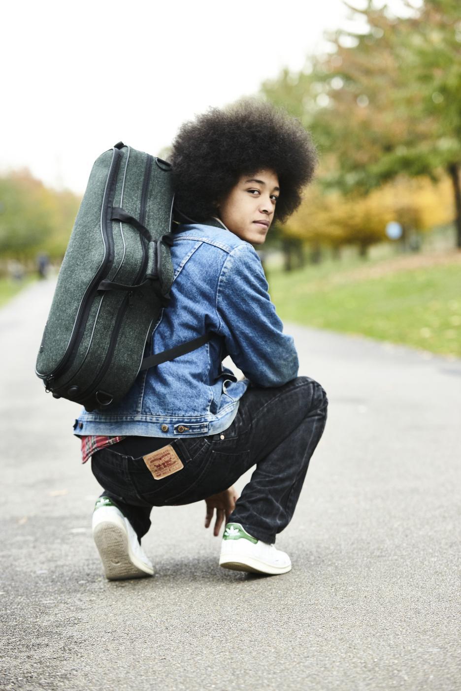 Boy With Racing Tweed Sax Case