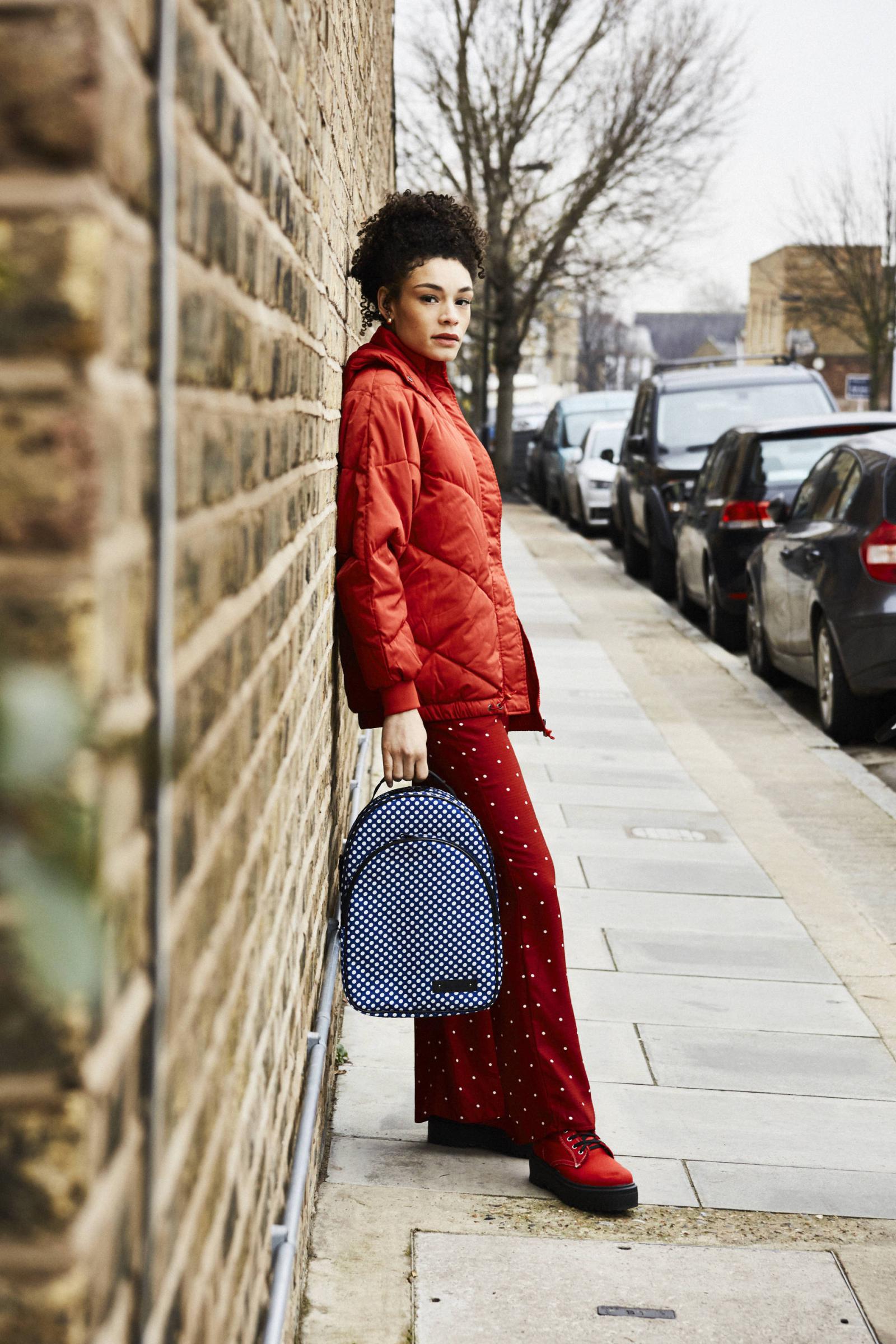 Girl Holding Blue ClarinetCase