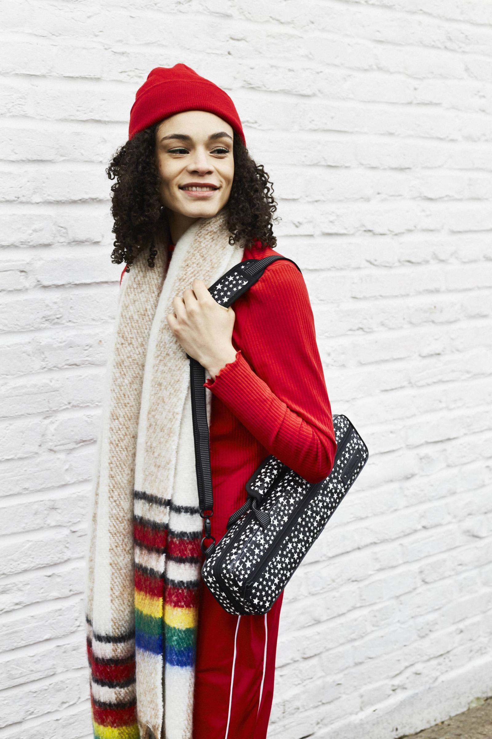 Girl Holding Starry Flute Case